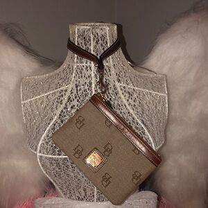 D&B Wristlet/Canvas. Dk Brown.Leather Trim. Red Interior. Zipper. Never Used.